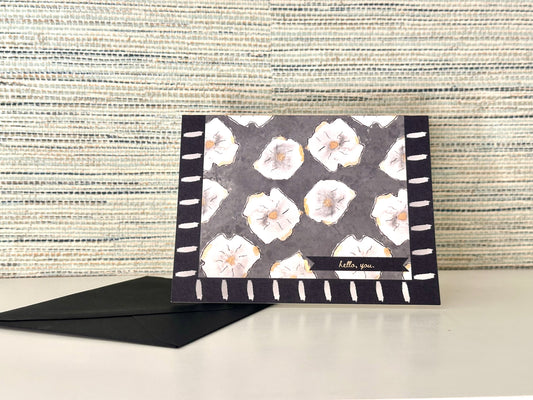 "hello, you." notecard set in The Rose (black)